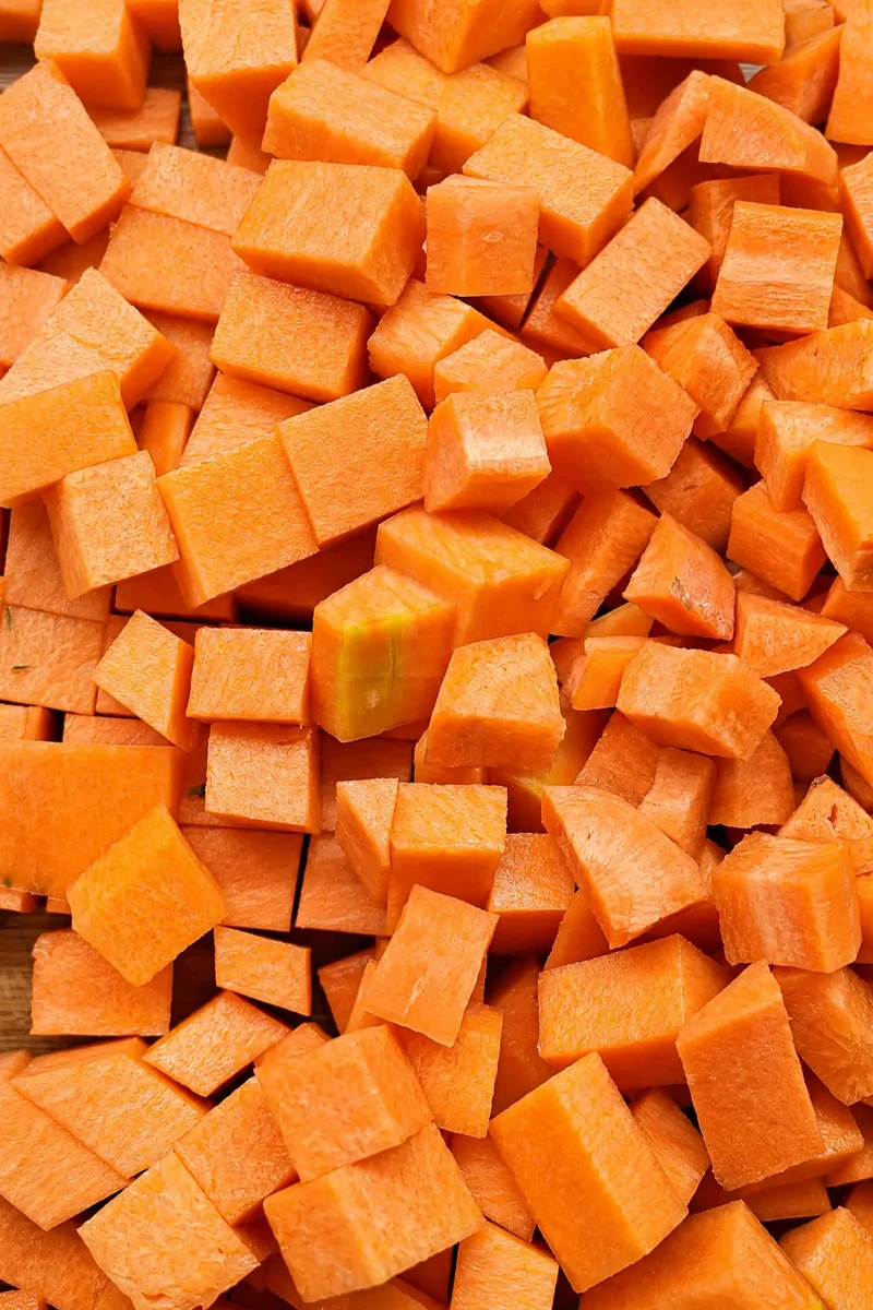 Pumpkin and red lentil soup diced pumpkin pieces ready for cooking.