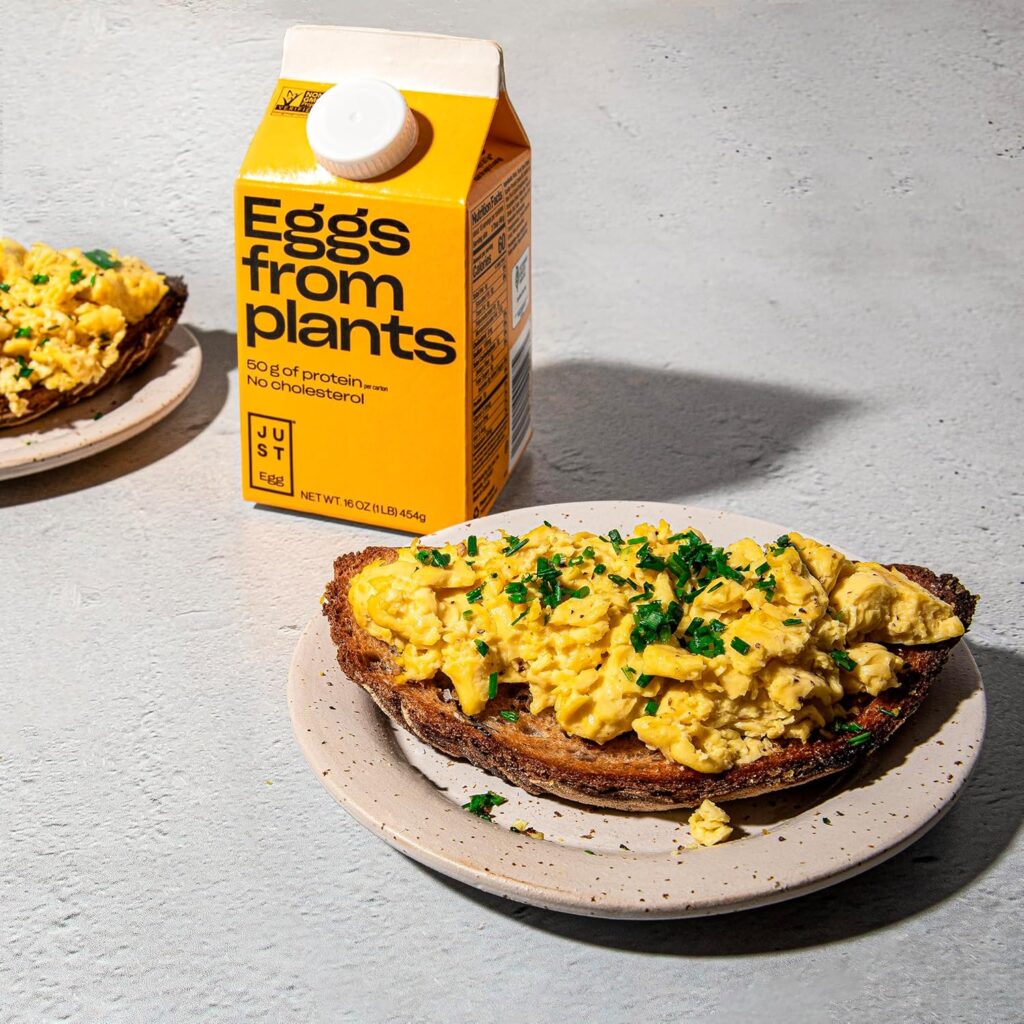 Liquid egg substitute Just Egg — vegan omelette cooked with plant-based mung bean egg on a white plate