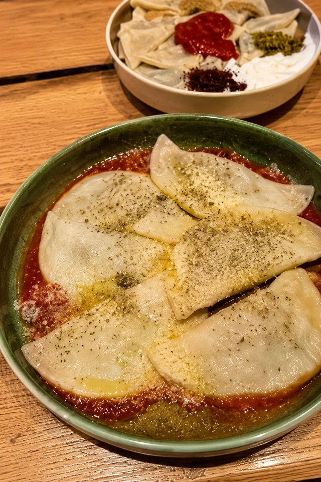 vegan restaurants Istanbul, close-up of handmade vegan dumplings at Community Kitchen, a cozy family-style vegan restaurant in Istanbul.